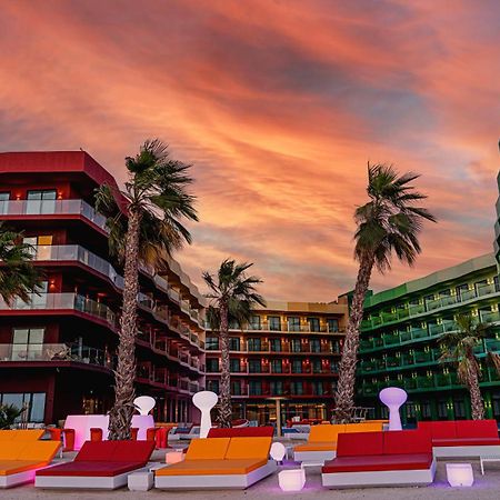 Voco Monaco Dubai By Ihg, Adults Only, World Islands Hotel Exterior photo The hotel at sunset