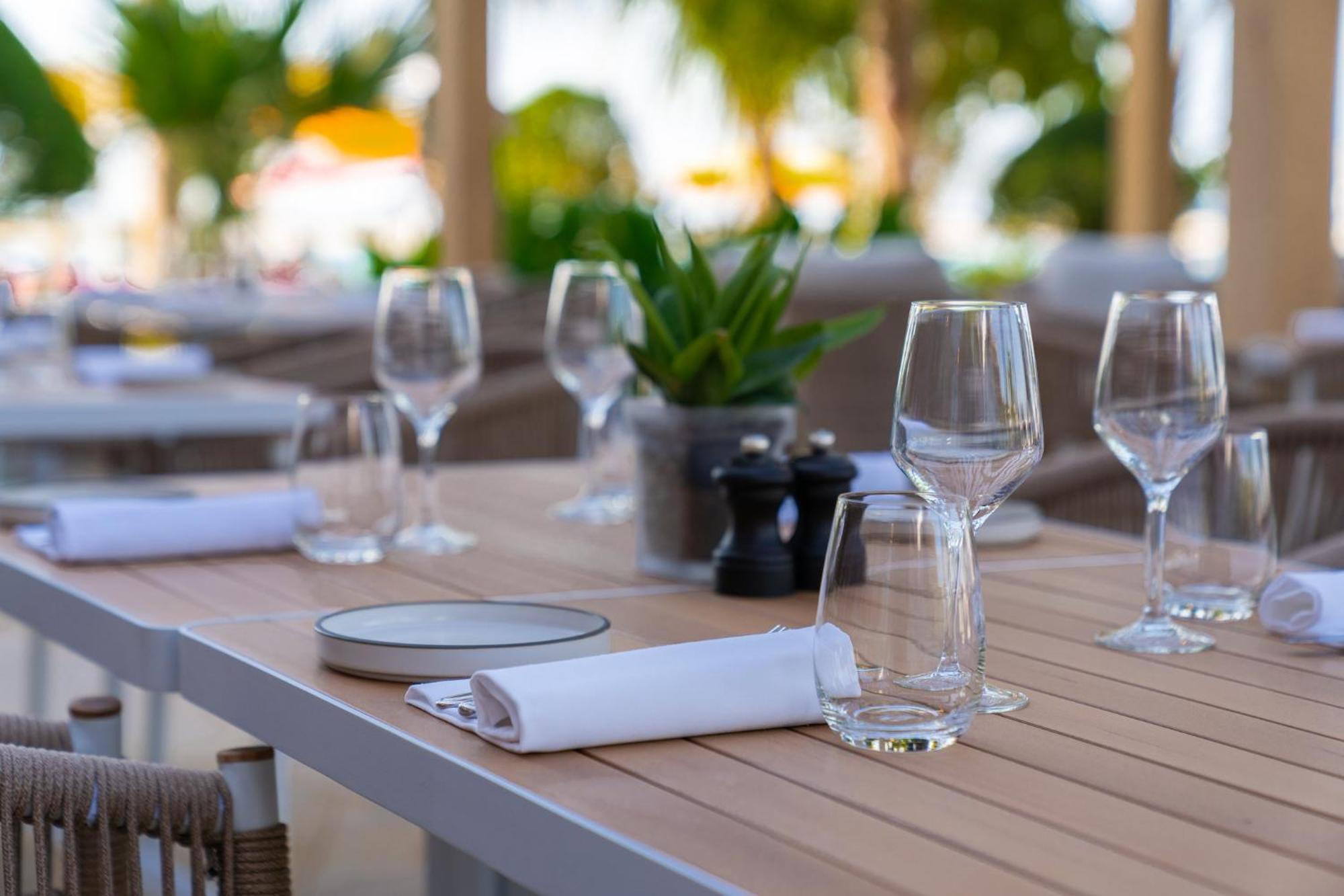 Voco Monaco Dubai By Ihg, Adults Only, World Islands Hotel Exterior photo A table set for fine dining